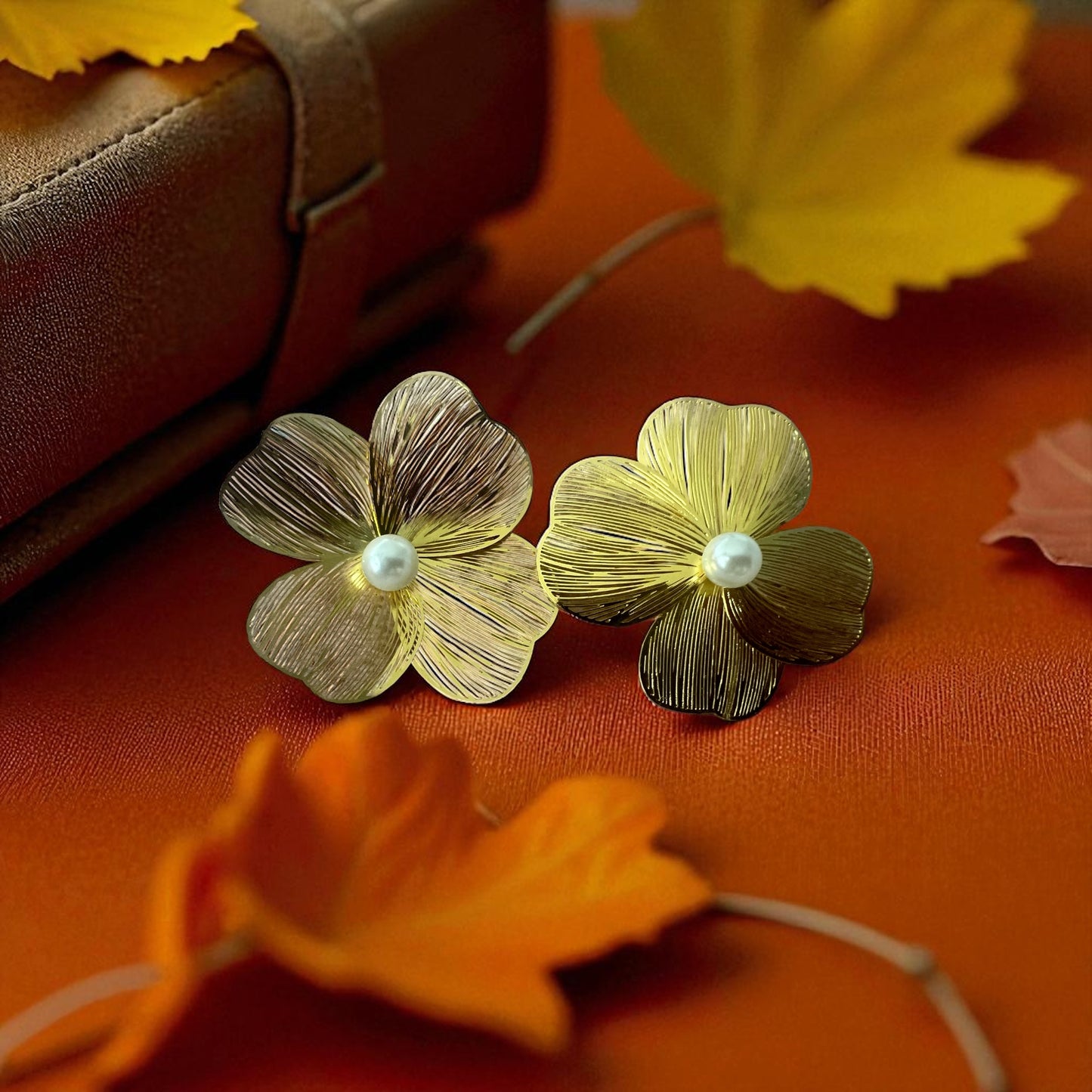 Flower-shaped drop earrings with a stud base