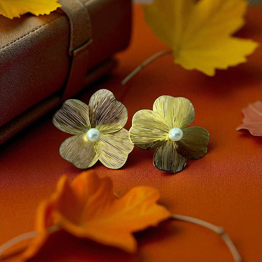Flower-shaped drop earrings with a stud base